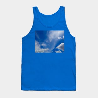 Fluffy white cloud shapes at blue sky. Tank Top